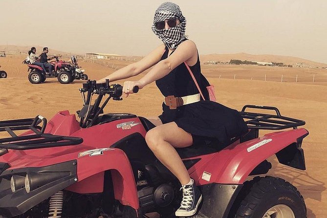 Shared Morning Desert Safari With Quad Bike in Dubai - The first big thrill: dune bashing at Lahbab