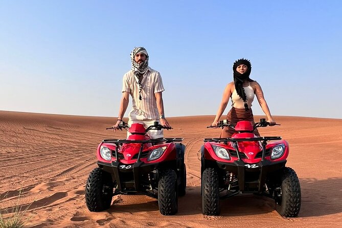 Sunrise Desert safari With Quad bike ride Sandboard & Camel ride - Red dunes before the city wakes