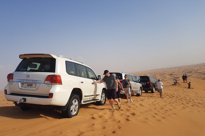 Sunrise Desert safari With Quad bike ride Sandboard & Camel ride - A 15-minute camel ride for an Arabian touch