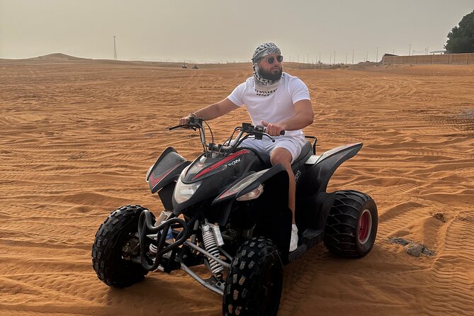 Sunrise Desert safari With Quad bike ride Sandboard & Camel ride - What is included, and what you still need to plan