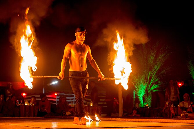 Sunset Camel Trekking with Falcon Show & VIP BBQ Dinner - Entering the Bedouin-style camp