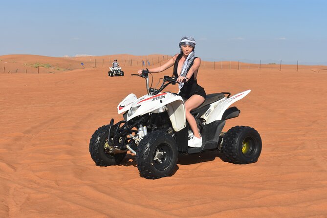 Sunset Desert Safari Quad bike Camel ride Sand Board & BBQ Dinner - Starting with quad biking at Al Lahbab