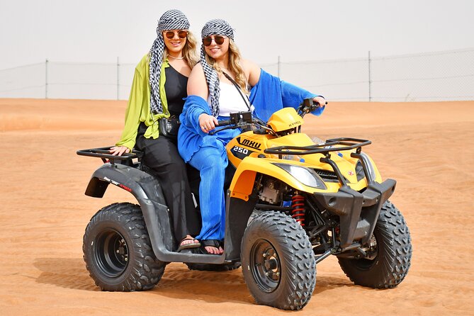 Sunset Desert Safari Quad bike Camel ride Sand Board & BBQ Dinner - From sunset to the Al Awir camp