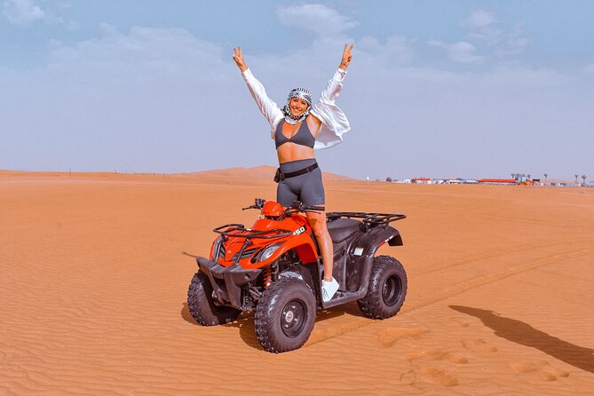 Sunset Desert Safari Quad bike Camel ride Sand Board & BBQ Dinner - The 4WD rush across the dunes
