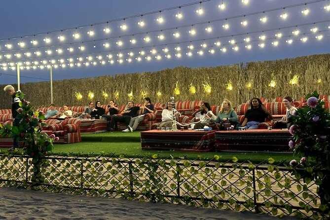 VIP Desert Safari Abu Dhabi with Private Seating Area - Falcons, Arabic dress, and the advertised extras