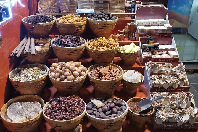 Walking tour Dubai Old Town / Old City, Creek, Abra, Souks - Textile Souk and the rhythm of the market lanes
